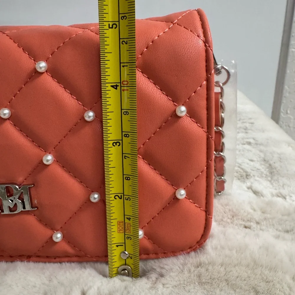 New Badgley Mischka Peach Quilted Crossbody Bag. Small defect see last pic.
